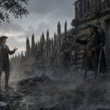Man in a tricorn hat and coat faces a crowd of soldiers by a wooden palisade in a smoky, desolate frontier scene.